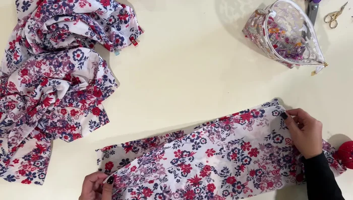 Insert sleeves: Insert sleeves into armholes, matching seams and gathering the top of the sleeves to fit.