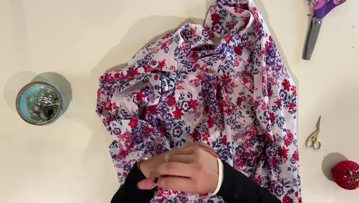 Insert and secure elastic into sleeves: Insert elastic through the sleeve hem gap, overlap ends, and zigzag stitch to secure. Close the gap.