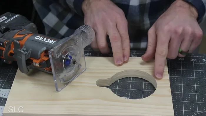 Round over the sharp edges of the side boards.