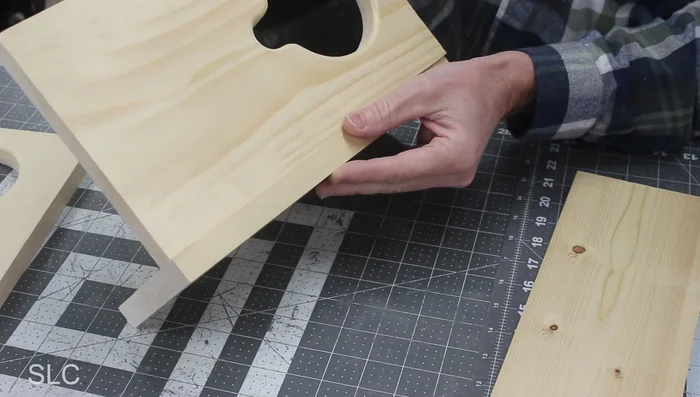 Attach the side boards to the top board with a 1/8 inch lip.