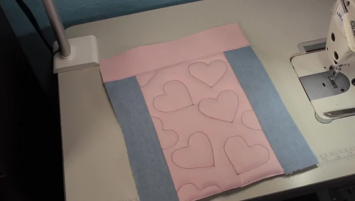 Attach the side panels and top piece to finish the back piece.