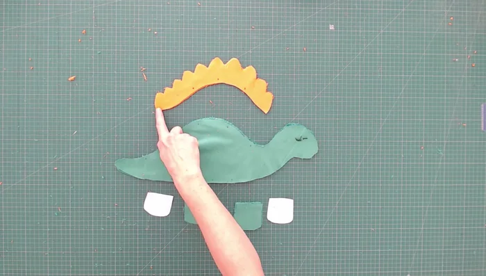 Clip seam allowance, turn spikes right side out, and use a tool to smooth out points.