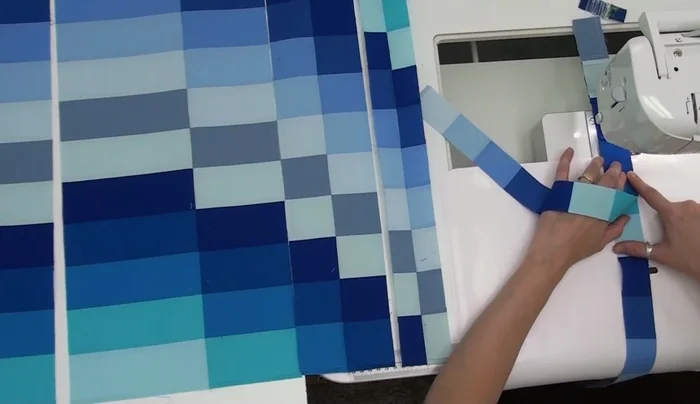 Piece rows together, matching seam allowances (minimal pinning technique shown).