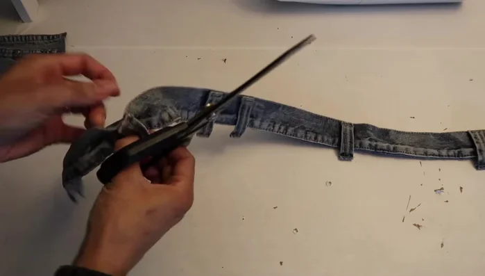 Cut off excess belt loop ends.