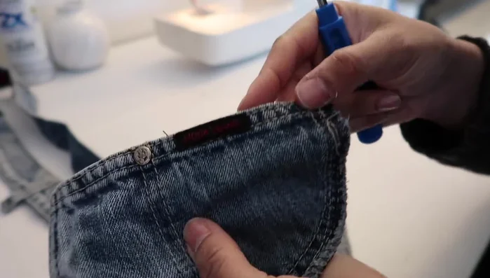 Cut off excess belt loop ends.