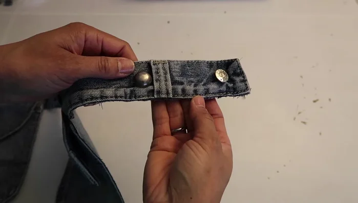 Add a button to tighten the belt.