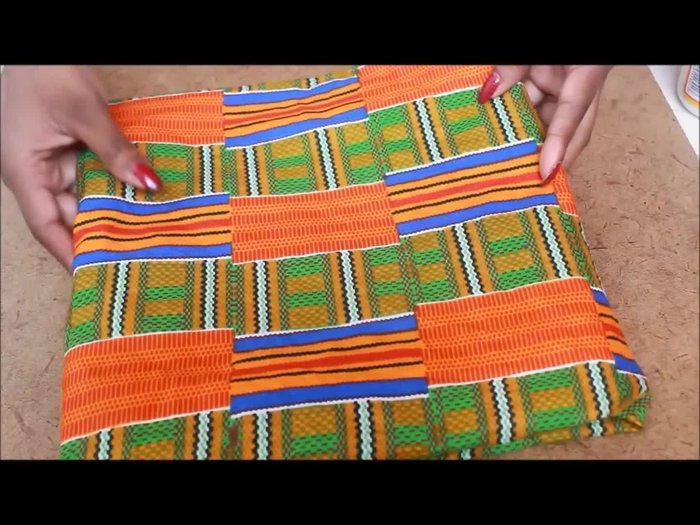 Prepare your materials: fabric, scissors, xacto blade, Mod Podge glue, sponge brush, heels, and a pentagon template (3.5 inches top, 3.5 inches length, 5 inches across).