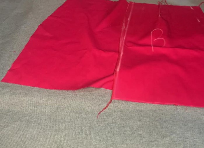 Attach the waist belt (iron if necessary). Sew the zipper and hem the bottom of the skirt.