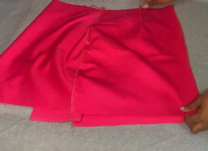 Attach the waist belt (iron if necessary). Sew the zipper and hem the bottom of the skirt.