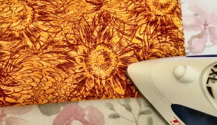 Press the bottom fold to mark the center.