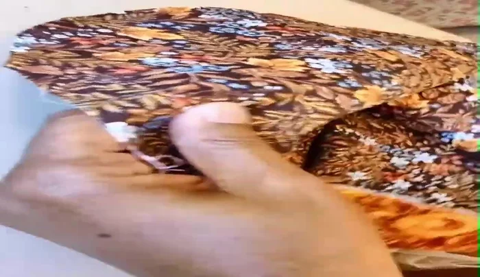 Check for length/short adjustments and cut tiny slits (1/4 inch) in the corners.