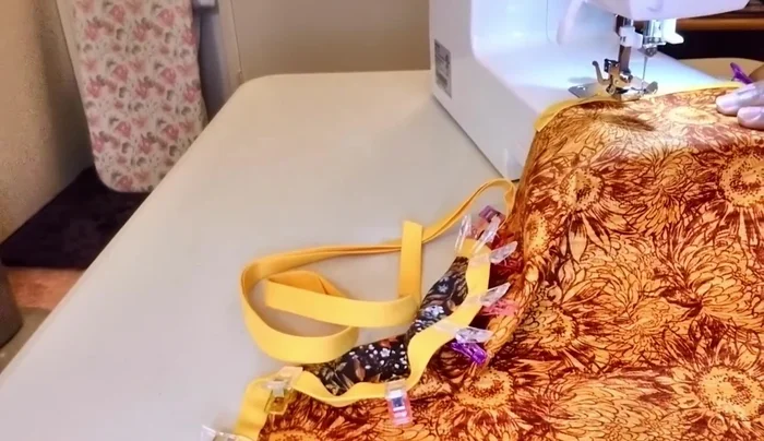 When approaching the other end, stitch a bit before removing from machine. Cut bias tape 1/4 inch past the end.