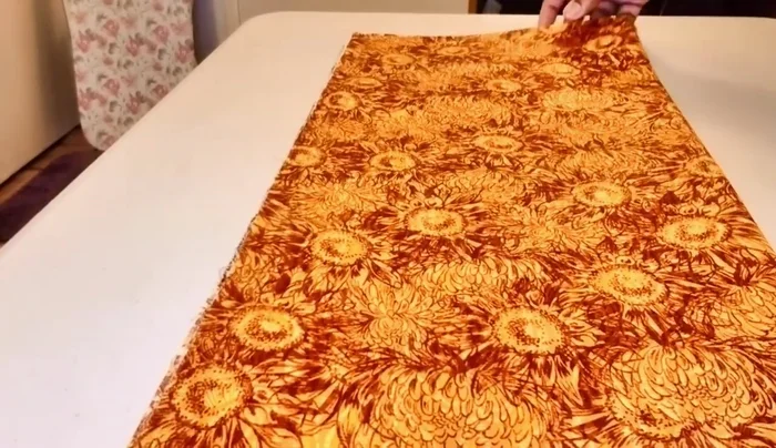 Press the bottom fold to mark the center.