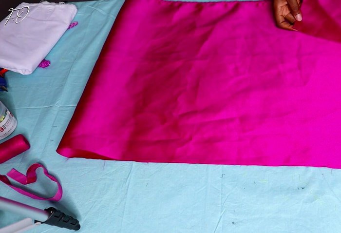 Turn inside out and position stitch line: Turn the fabric inside out and move the stitch line to the center.