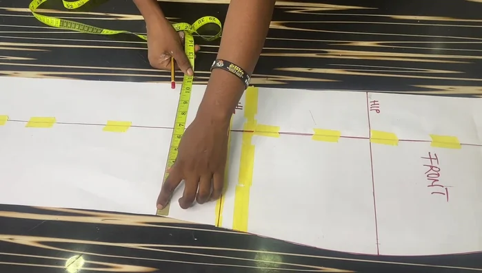 Repeat step 7 for all slashes. Connect the points to create a rounded curve on the lower part of the pattern. Add a 1.5-inch sewing allowance.