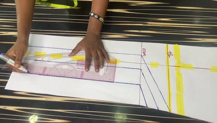 Repeat step 7 for all slashes. Connect the points to create a rounded curve on the lower part of the pattern. Add a 1.5-inch sewing allowance.