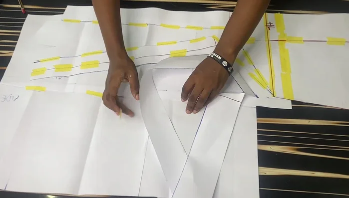 Repeat step 7 for all slashes. Connect the points to create a rounded curve on the lower part of the pattern. Add a 1.5-inch sewing allowance.