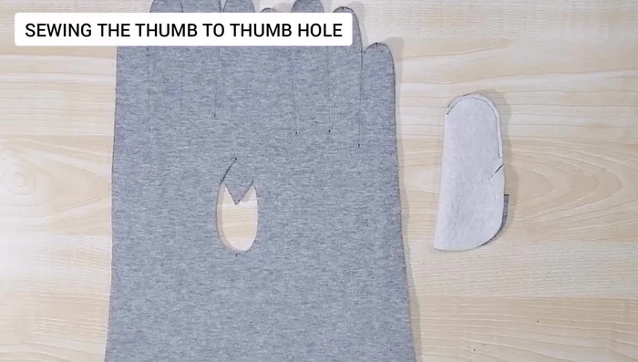 Attach thumb to glove body. Align points B to C and C to D on the thumb piece with corresponding points on the glove body, and sew.