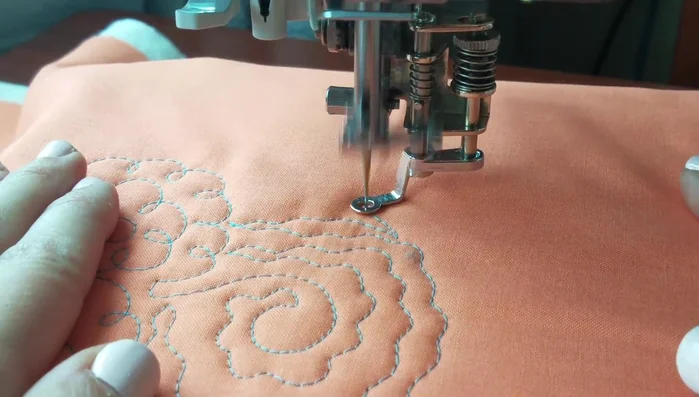 Proceed to the next flower, creating a partial row and swirl before adding the wavy lines.