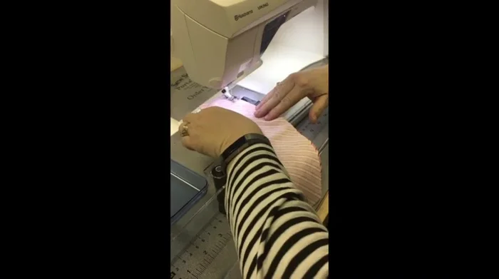 Sew the side pieces: Sew the six side pieces together, using a slightly more than 1/4 inch seam allowance. Follow the curve and stop at each marked line.