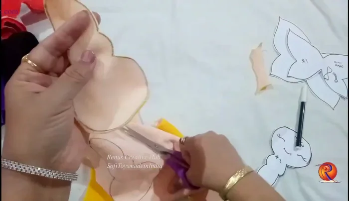 Sew the two body pieces together, leaving an opening at the back for stuffing.