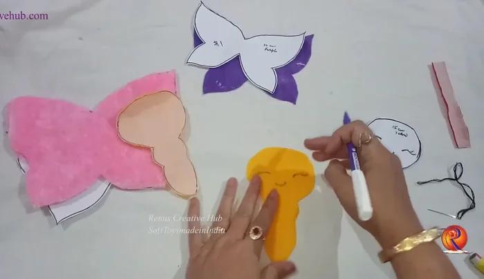 Sew the two body pieces together, leaving an opening at the back for stuffing.