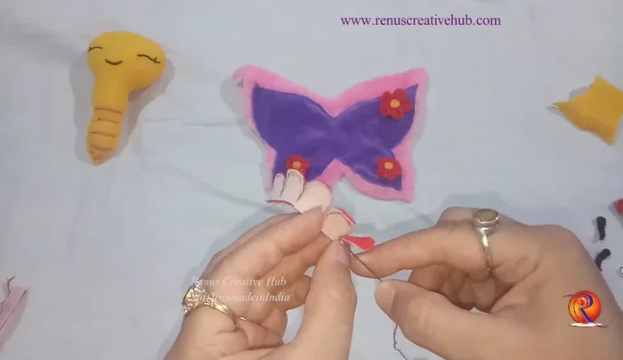 Attach the wings to the body using a hidden stitch.