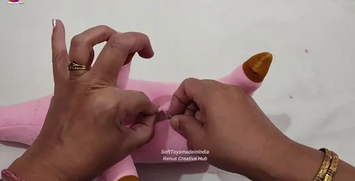 Close the bottom opening with a hidden stitch.