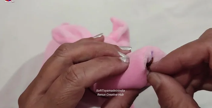 Outline the ice cream details using brown thread back stitch.