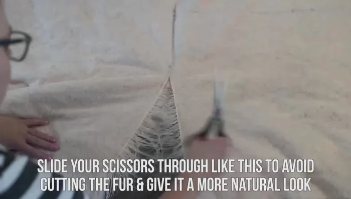 Place the backing fabric pieces right sides together, with the shorter piece on top. Machine stitch only the first and last couple of inches (using a 1/2 inch seam allowance).