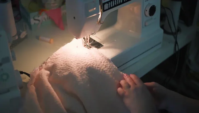 Sew the fur and backing together using a 1/2 inch seam allowance and a longer stitch length (to ease sewing through the thick fabric).