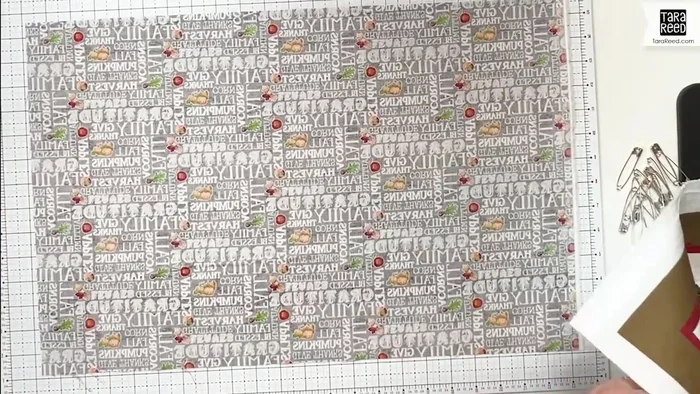 Assemble the placemat layers: Layer the backing fabric (right side down), batting, and placemat design (right side up). Pin together.