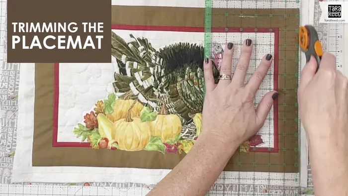 Trim the placemat: Once quilted, trim the placemat to the desired finished size (11x18 inches in this example).