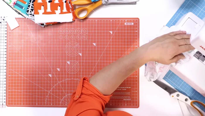 Finish edges: Use a zig-zag stitch (4mm wide) to neaten the edges of the hat.