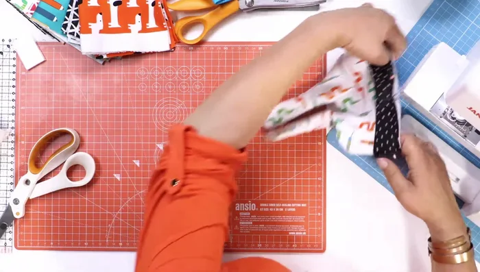 Finish the band: Sew the band to the hat, ensuring an even stretch on the band. Reinforce the seams on the inside of the hat to secure the layers.