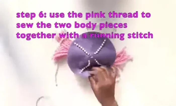 Sew the purple and pink pieces together with a running stitch, leaving an opening for stuffing.