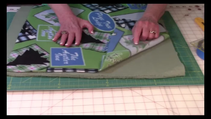 Straighten all edges and cut off the selvage (the rolled-up edges).