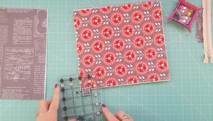 Cut 2-inch squares from each bottom corner of the exterior and lining fabrics to create a flat bottom.