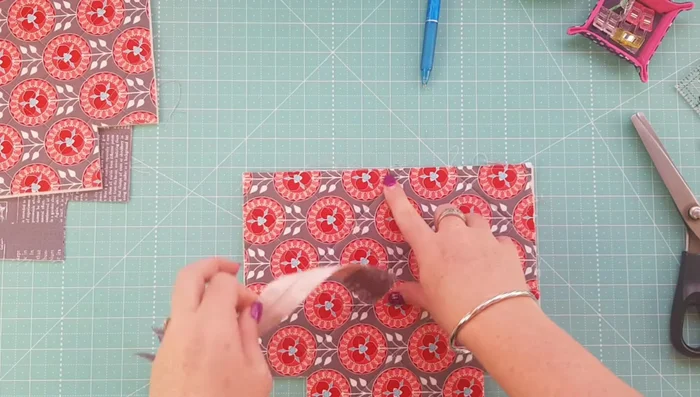 Stitch the zipper to the exterior and lining fabrics.