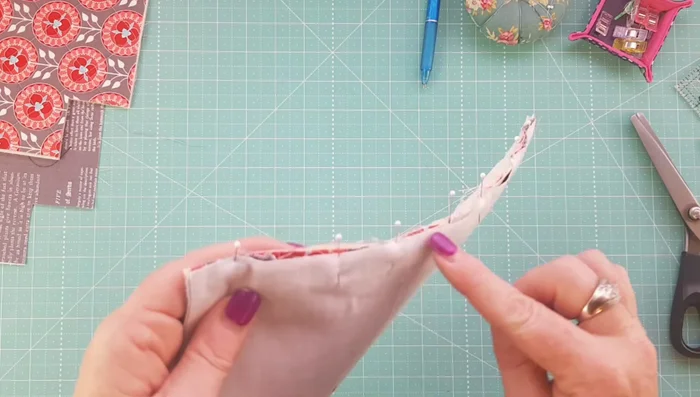 Stitch the zipper to the exterior and lining fabrics.