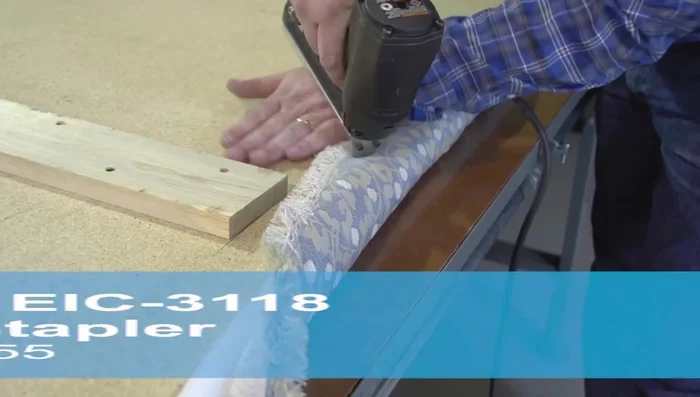 Staple the bottom edge, trimming excess batting and fabric as needed.