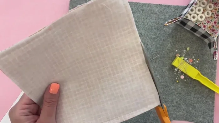 Trim the corners and seam allowance to 1/4 inch. Carefully clip the corners to reduce bulk.