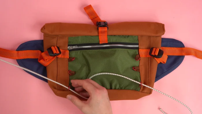 Cut about a yard and a half of elastic cord.