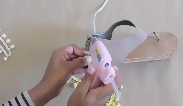 Attach a second color of trim underneath the first.