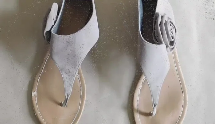 Prepare sandals (remove extra residue, loose threads).