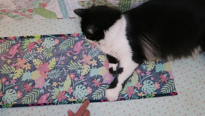 Fold and press the short edges twice (1/4 inch each time).