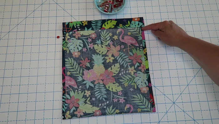 Sew along the sides and bottom, leaving the drawstring openings unsewn.