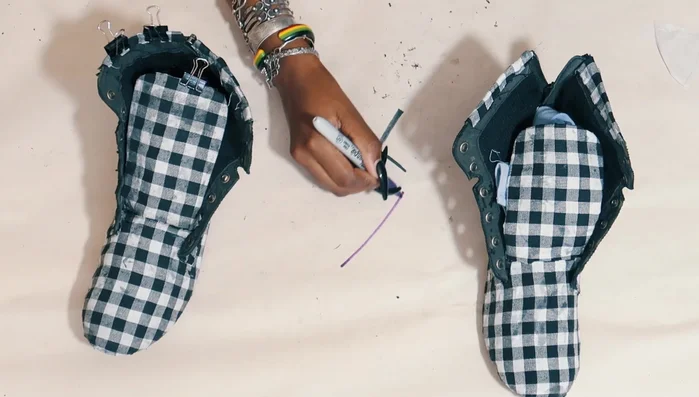 Cover raw edges using strips of fabric from the old dress and other scraps.