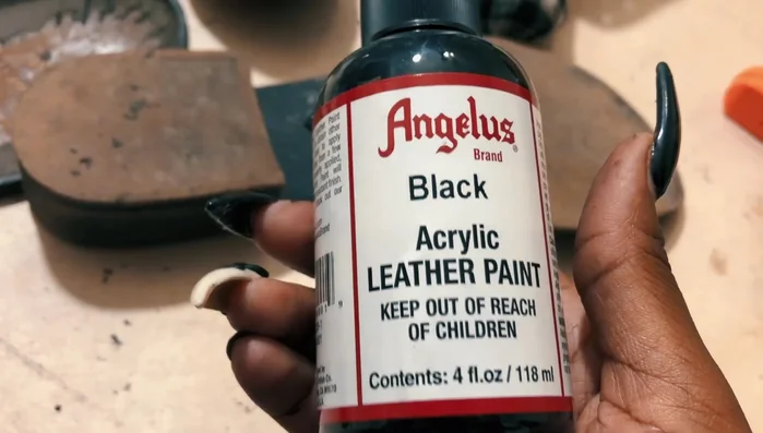 Glue the soles back onto the boots.