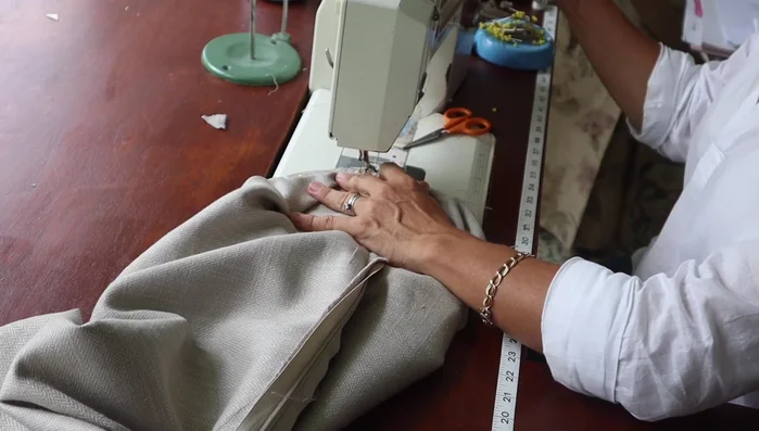 Sew the end circles to the pillow body, using a welt foot to get close to the cording.